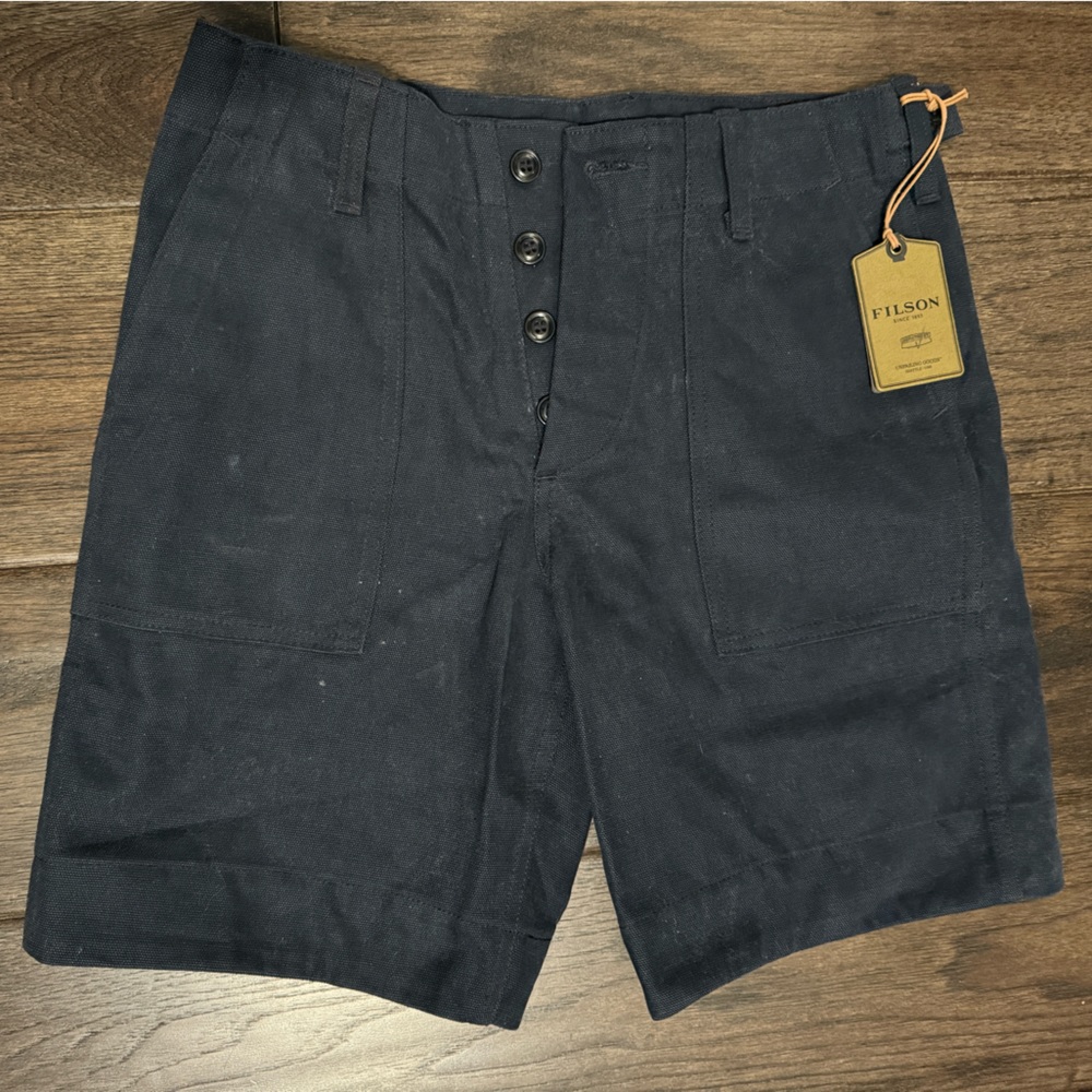 Filson new w tags. Woman blue shorts. Canvas. 28 waiste.